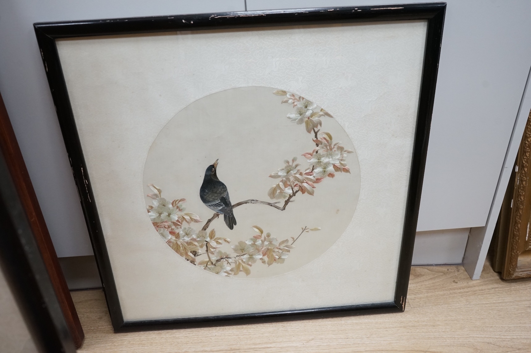 Seven Chinese embroideries on silk, mountainous landscapes and birds, largest 121cm high